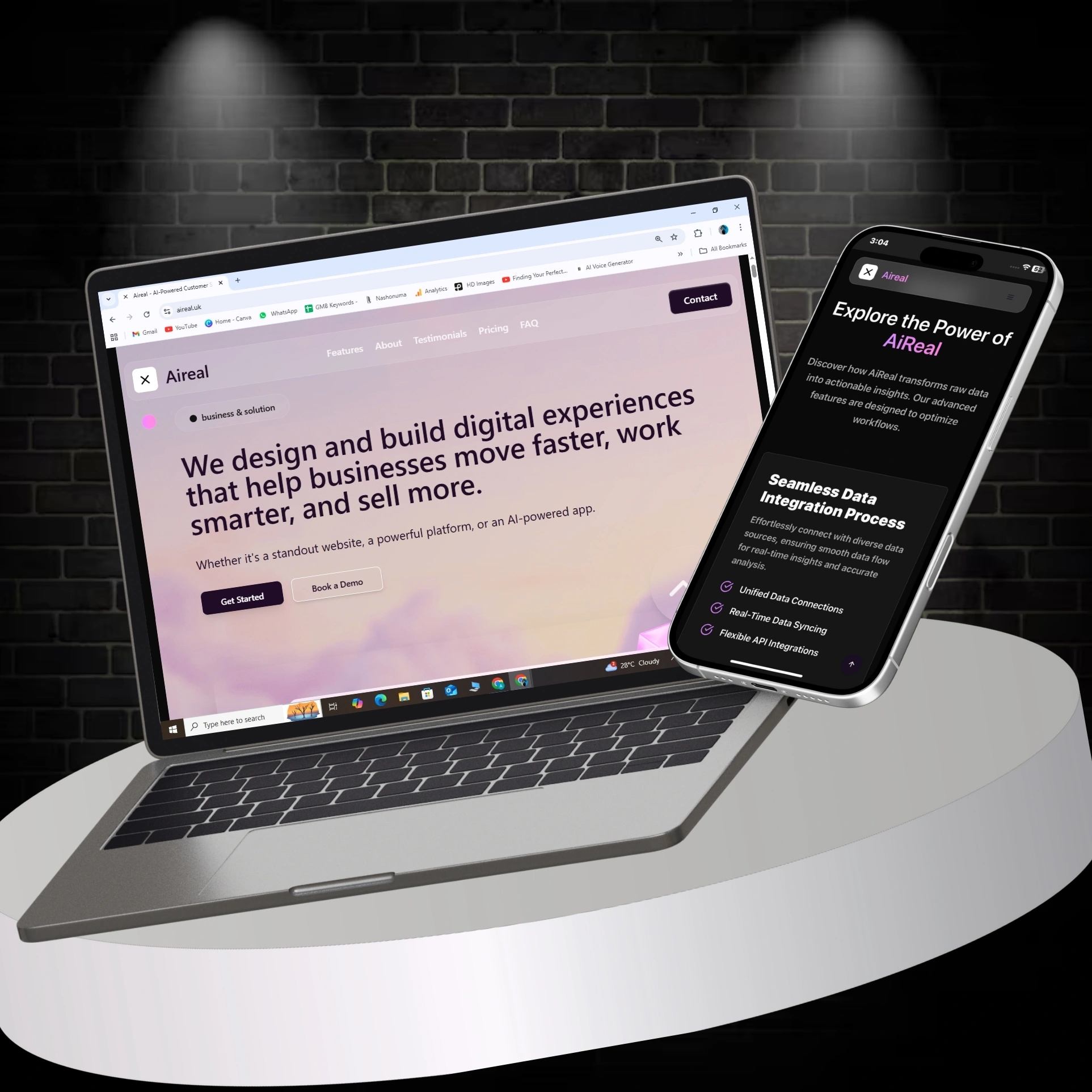 AiReal homepage hero and data-integration section rendered together on a laptop and a phone