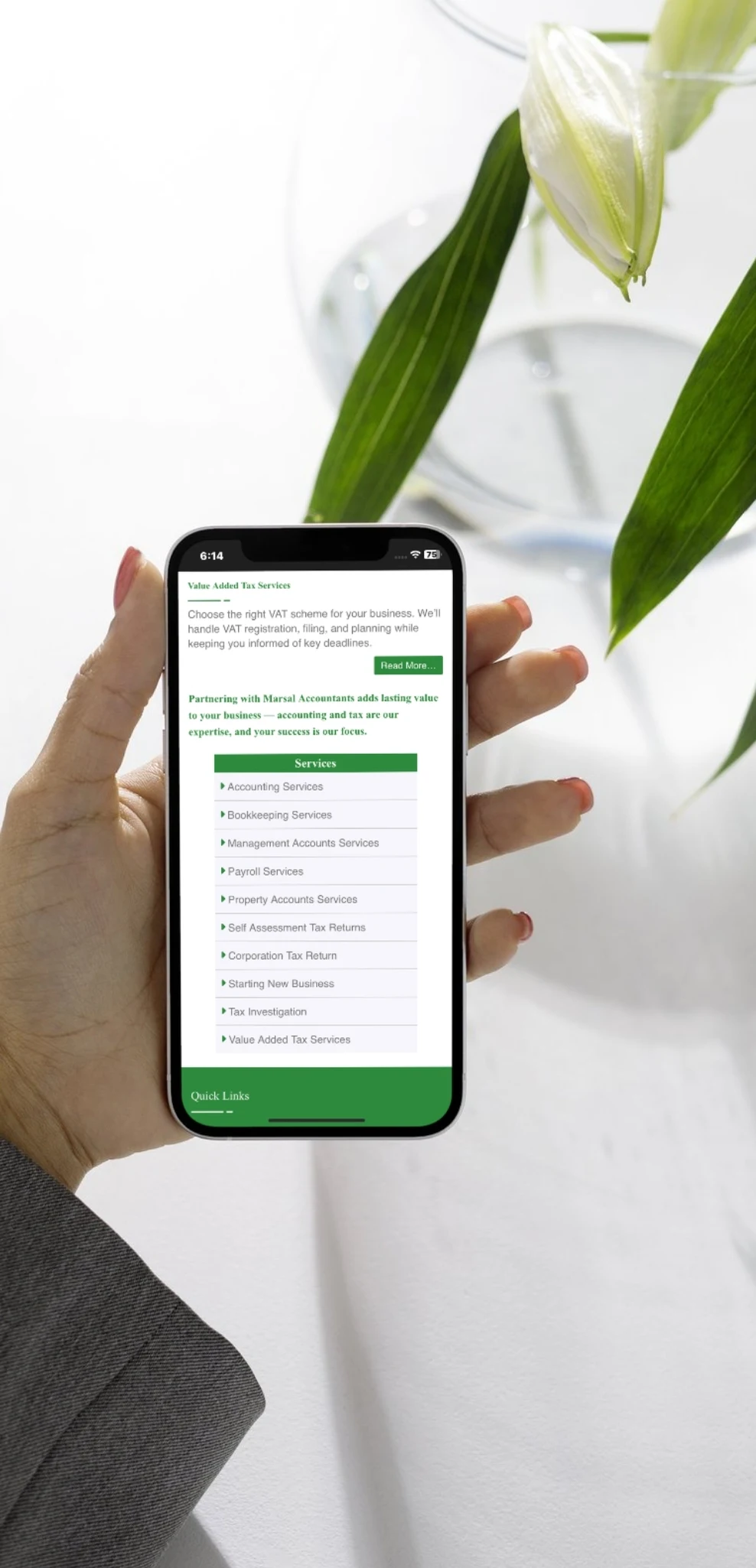 Marsal Accountants company-profile page shown on a mobile phone with the responsive layout