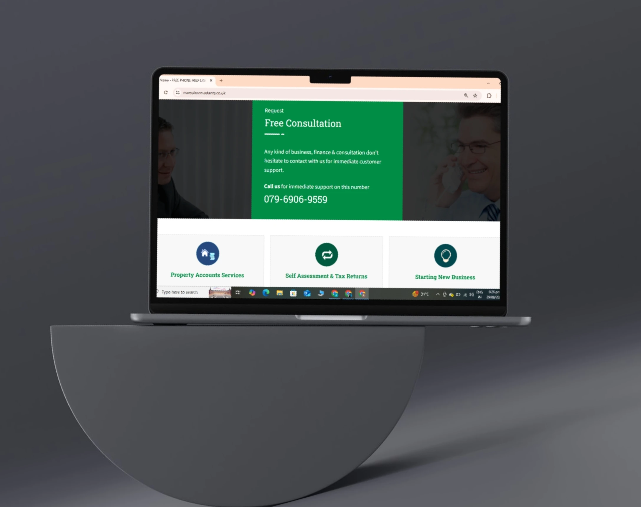 Marsal Accountants free-consultation request panel and service cards rendered on a laptop
